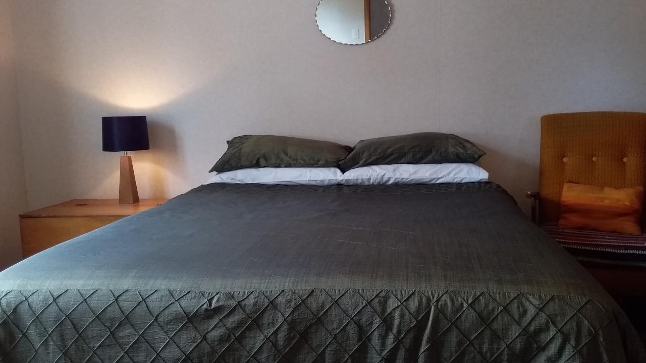 Master bedroom has 1 queen bed and 1 single bed, the en-suite has a basin, toilet and shower. beds have electric blankets.
