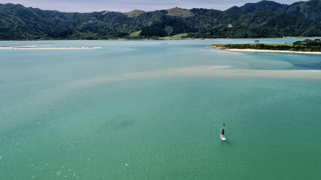 Stand up Paddleboarding in Wainui Bay