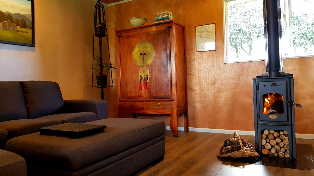 Lounge, warm and cosy, bathed in natural light