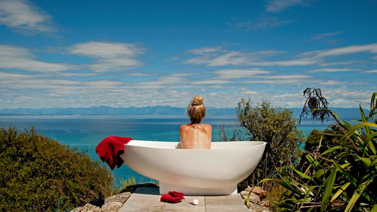 Outdoor bath tub, panoramic view of Tasman Bay