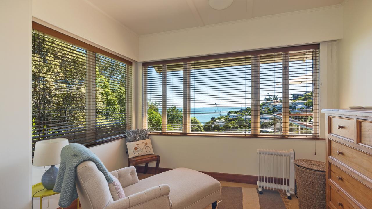 Sunroom with futon sofa in king single size
