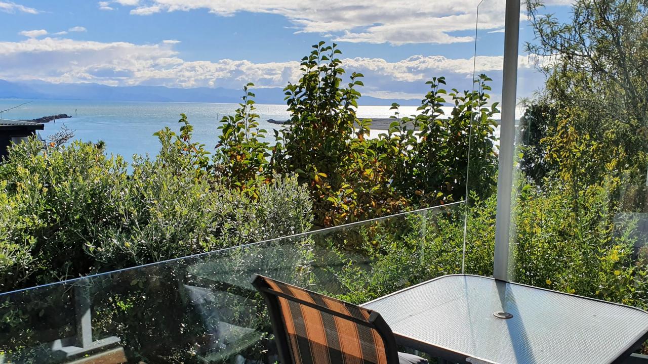 Outdoor dining with sea views
