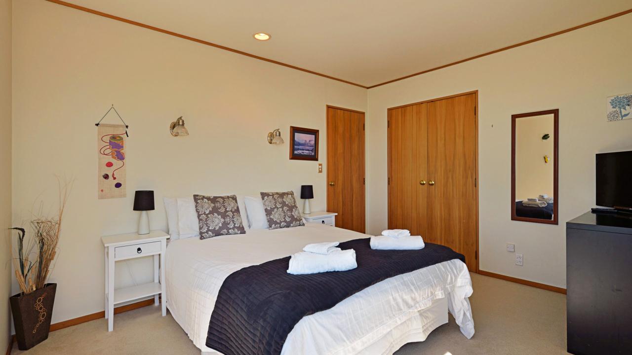 Bedroom 2 with king bed & second TV & DVD
