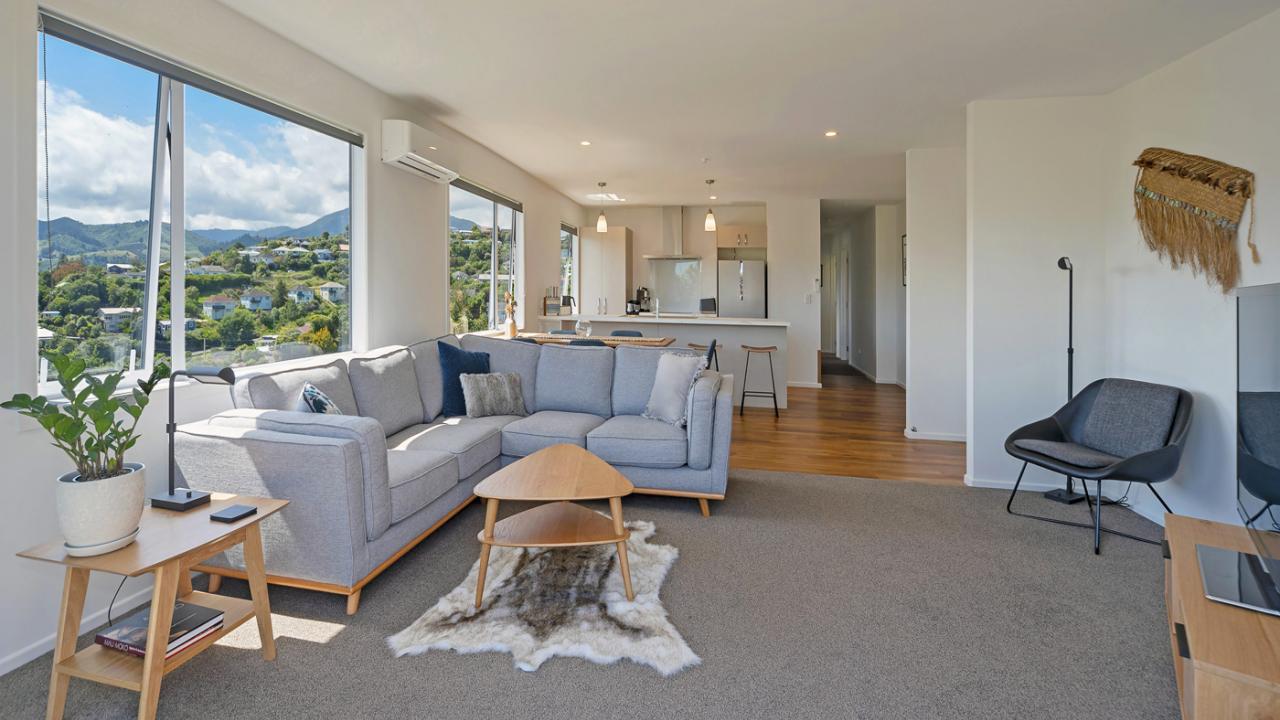 Open living, dining and kitchen areas
