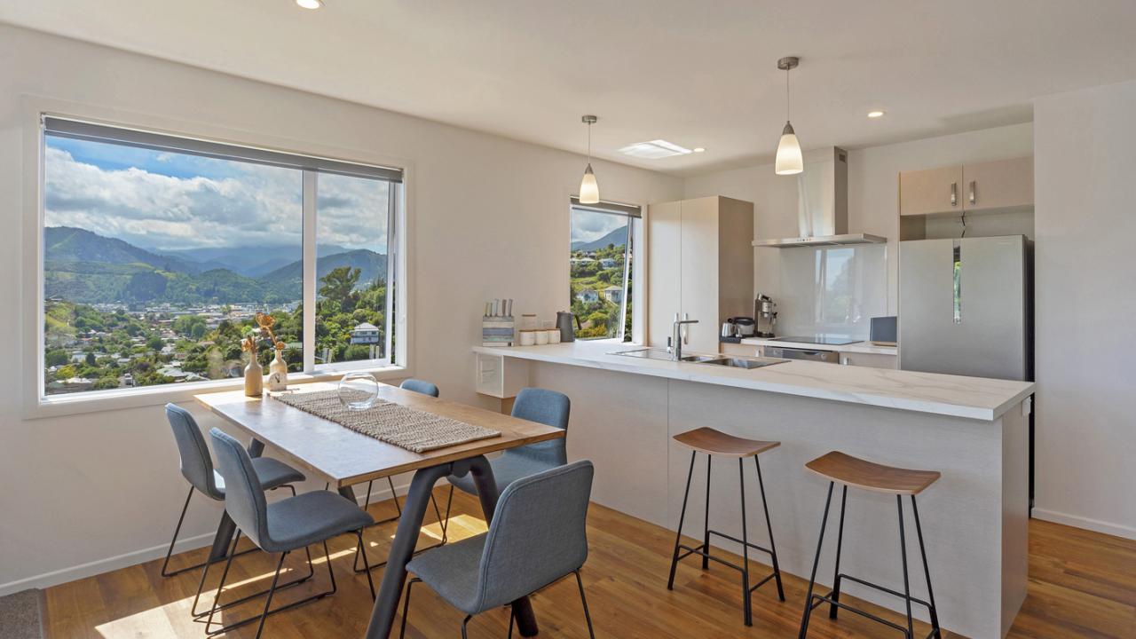 Open kitchen and dining areas
