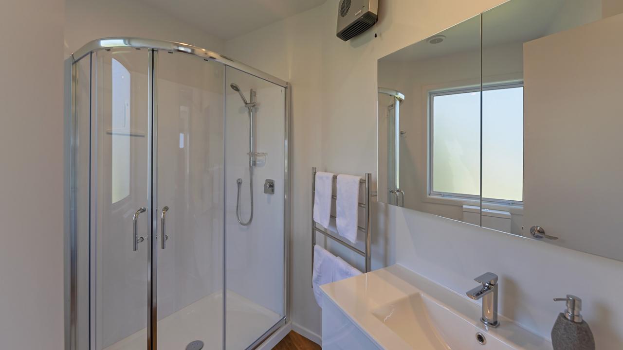Bathroom 2 with shower, toilet & vanity
