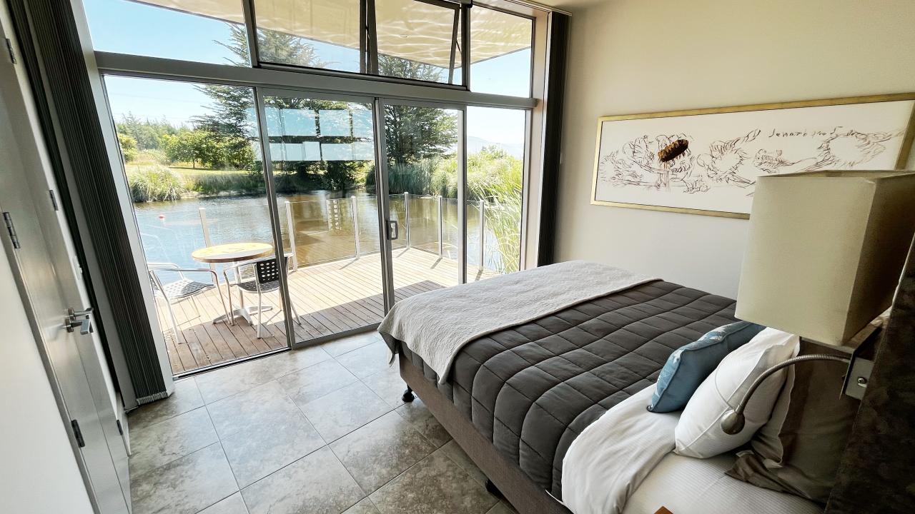 Wake up with a view and have your morning coffee on the deck overlooking the pond.