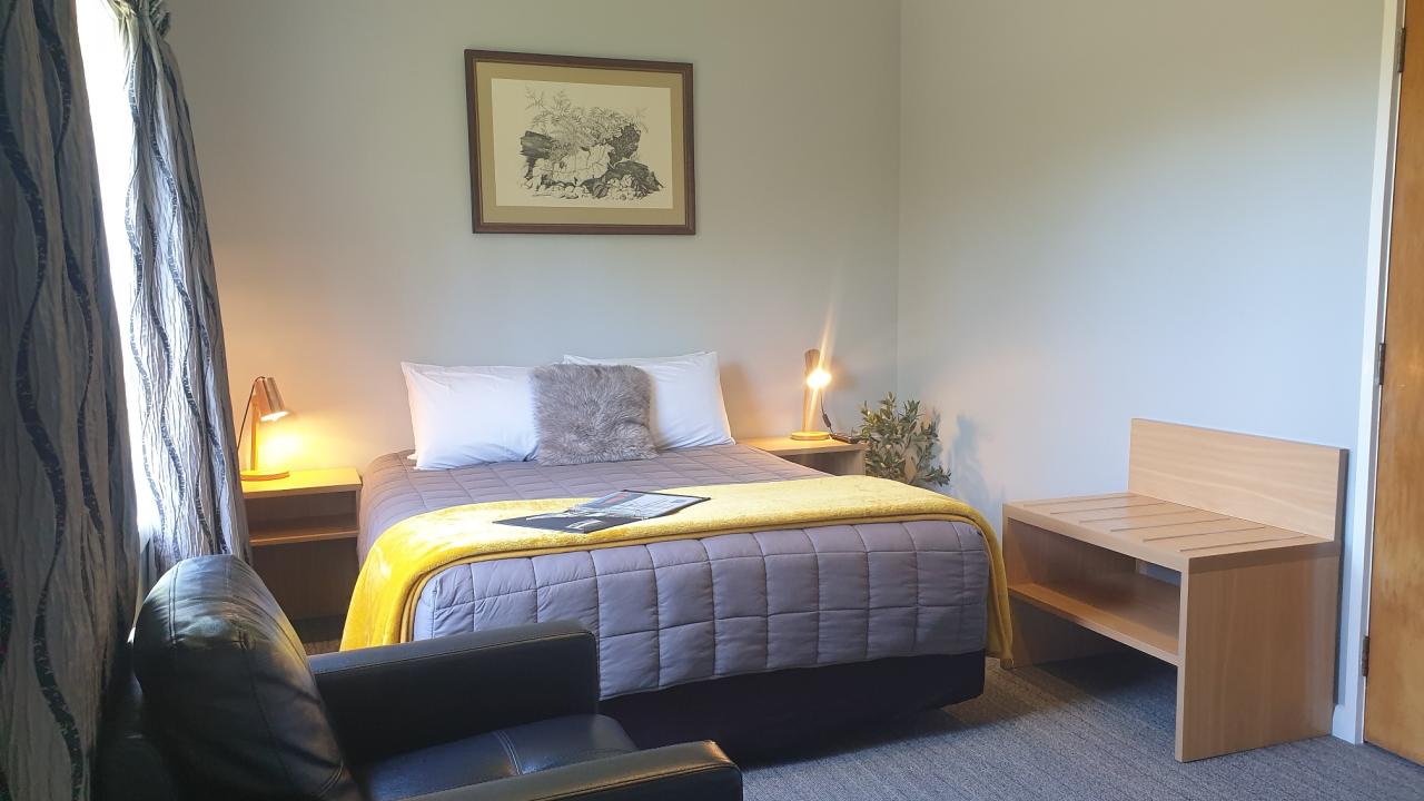 Double ensuite with queen bed, tea & coffee, mini fridge.