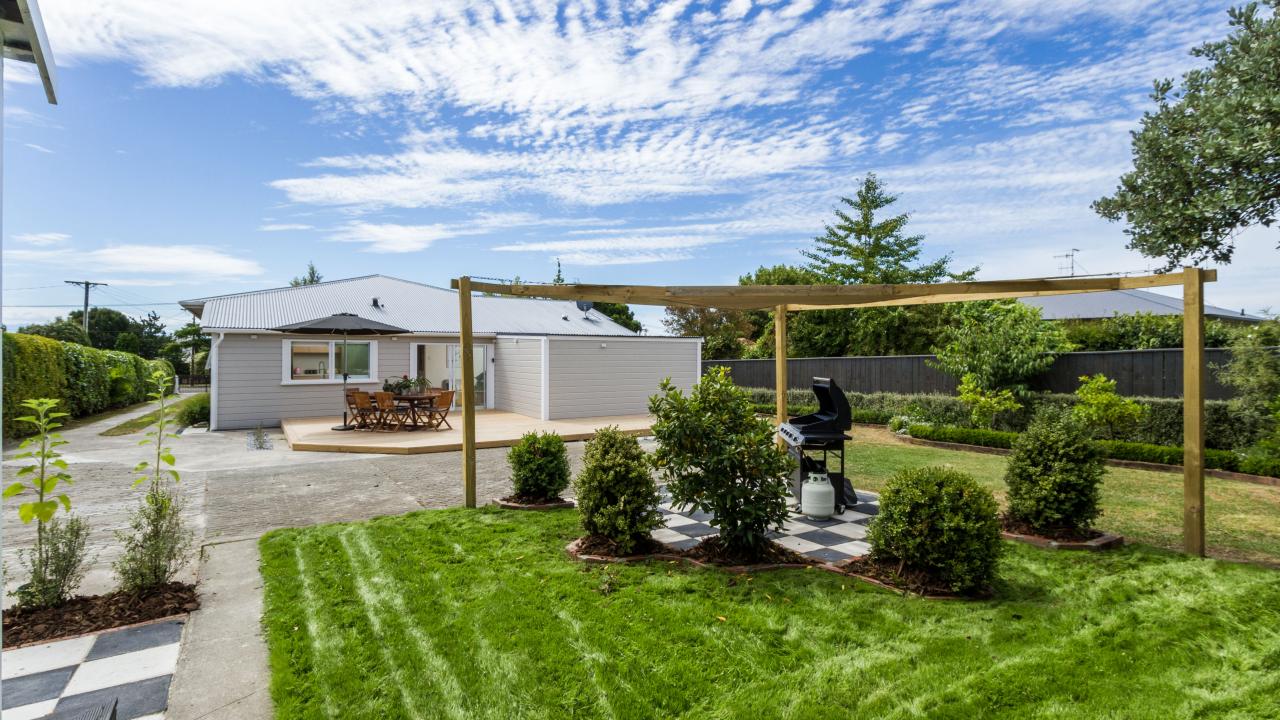 Back garden with large deck and private BBQ area