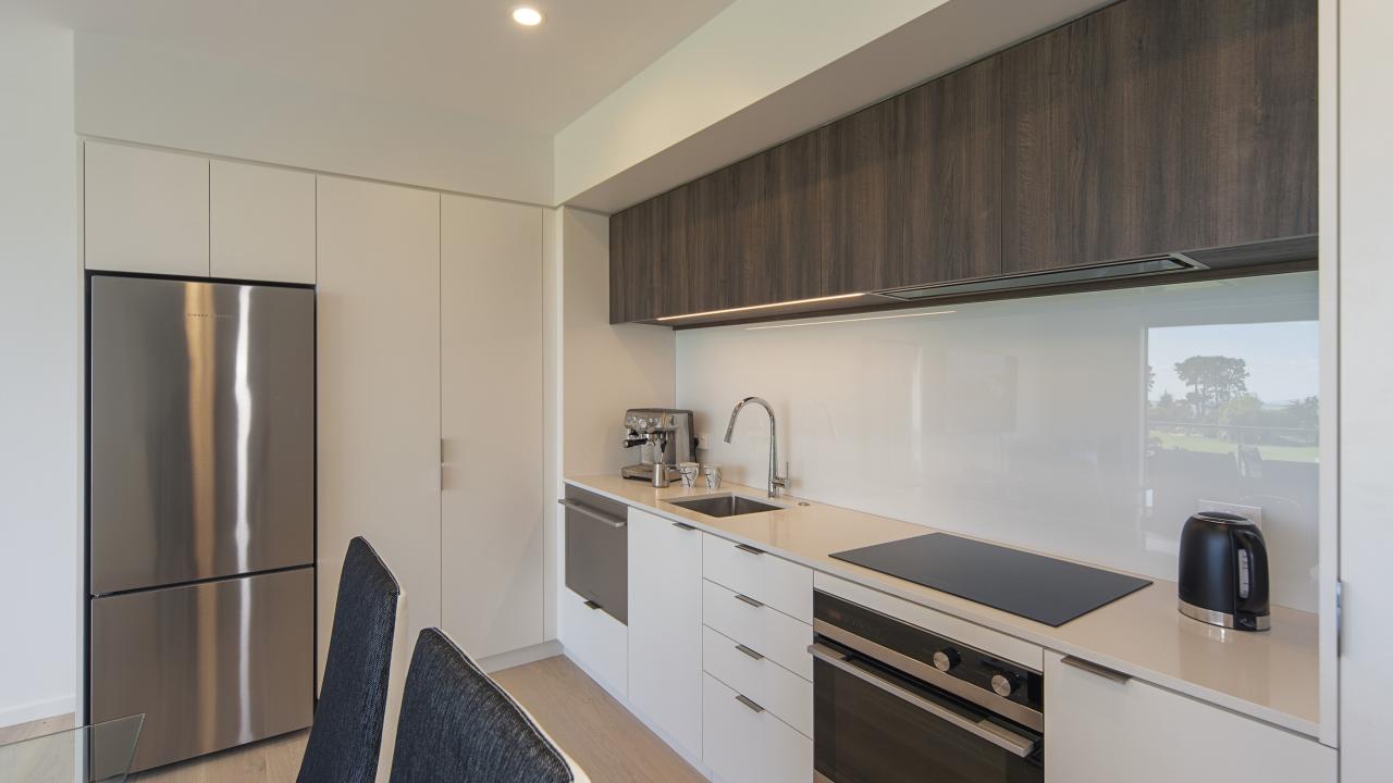 Kitchen offers Quality Espresso Machine, Dishwasher, Stove & Oven.