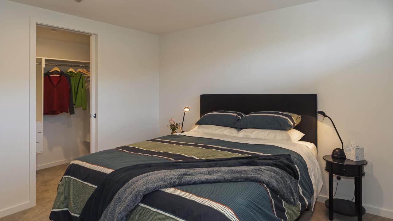 Bedroom with King bed & Walk-in Wardrobe.