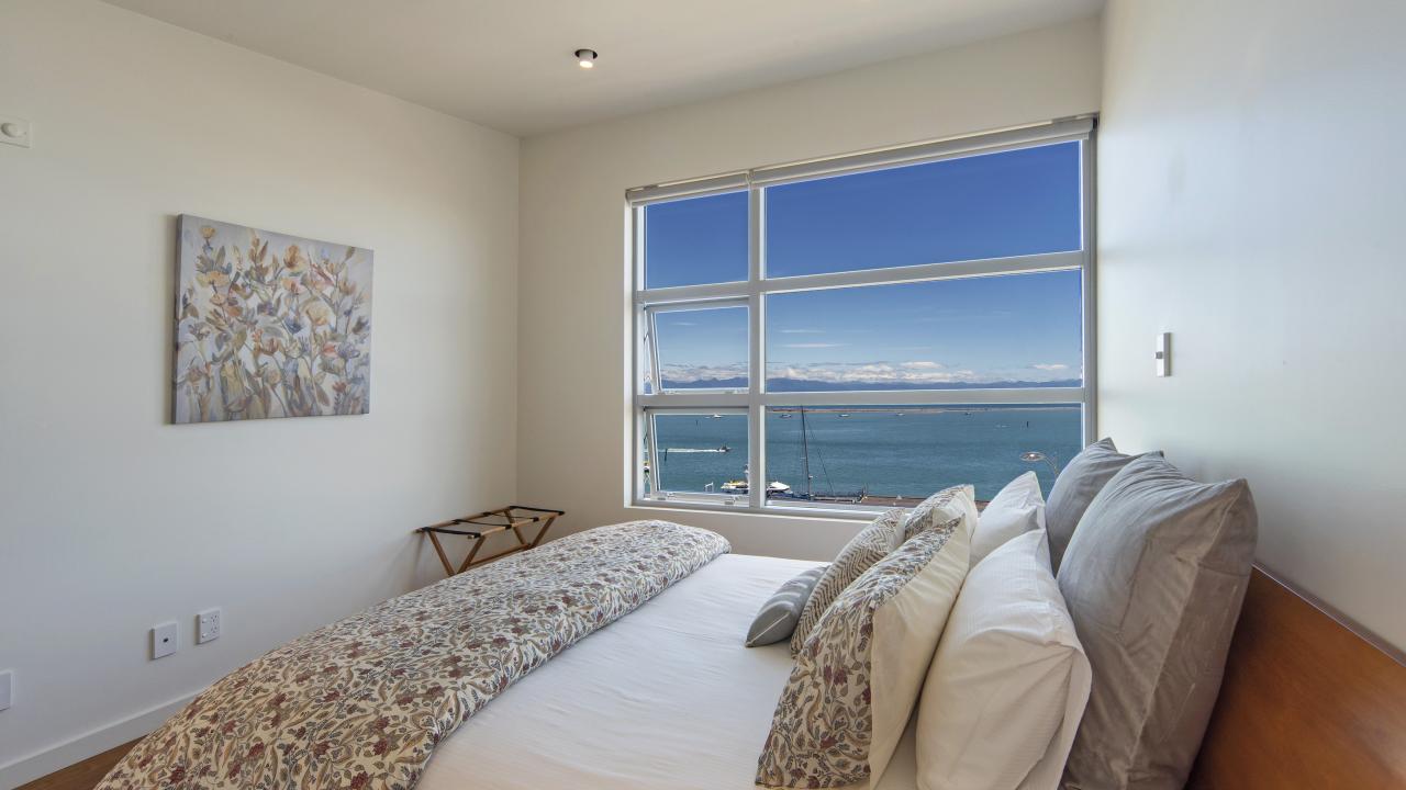 Bedroom 2 with Queen bed & Sea views