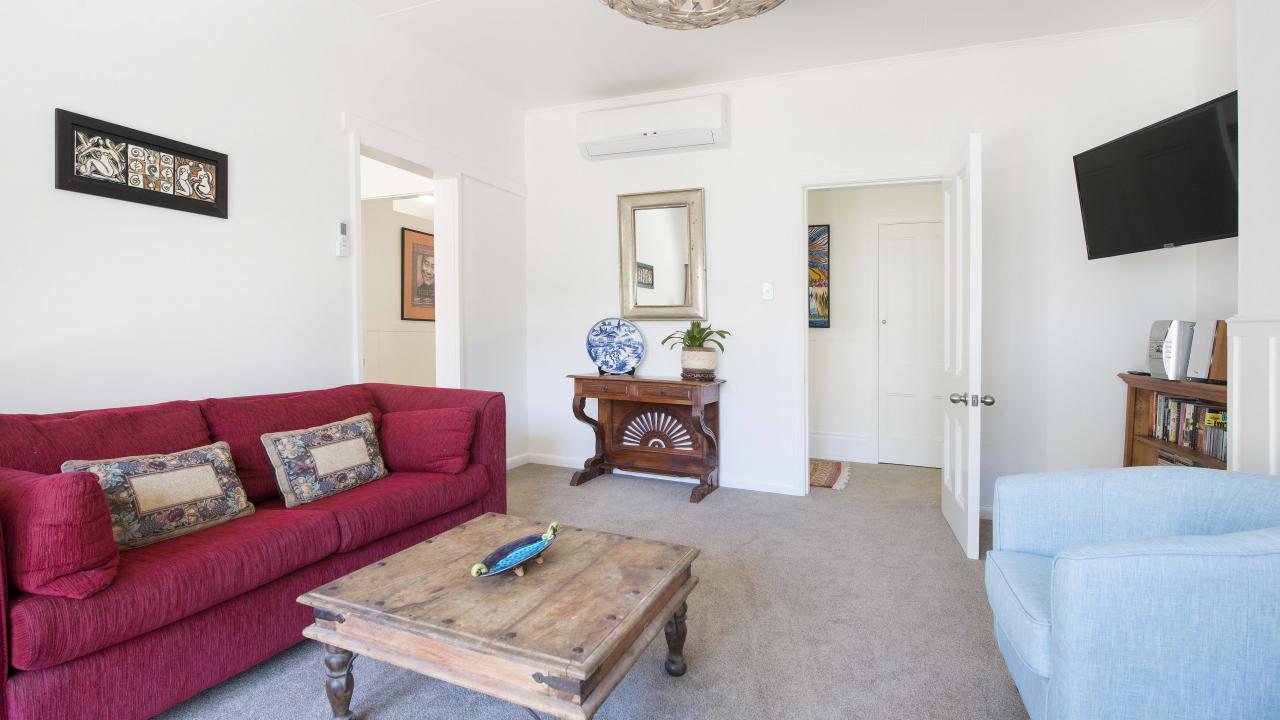 Lounge with Smart TV, Freeview, Movie & Book collection.
