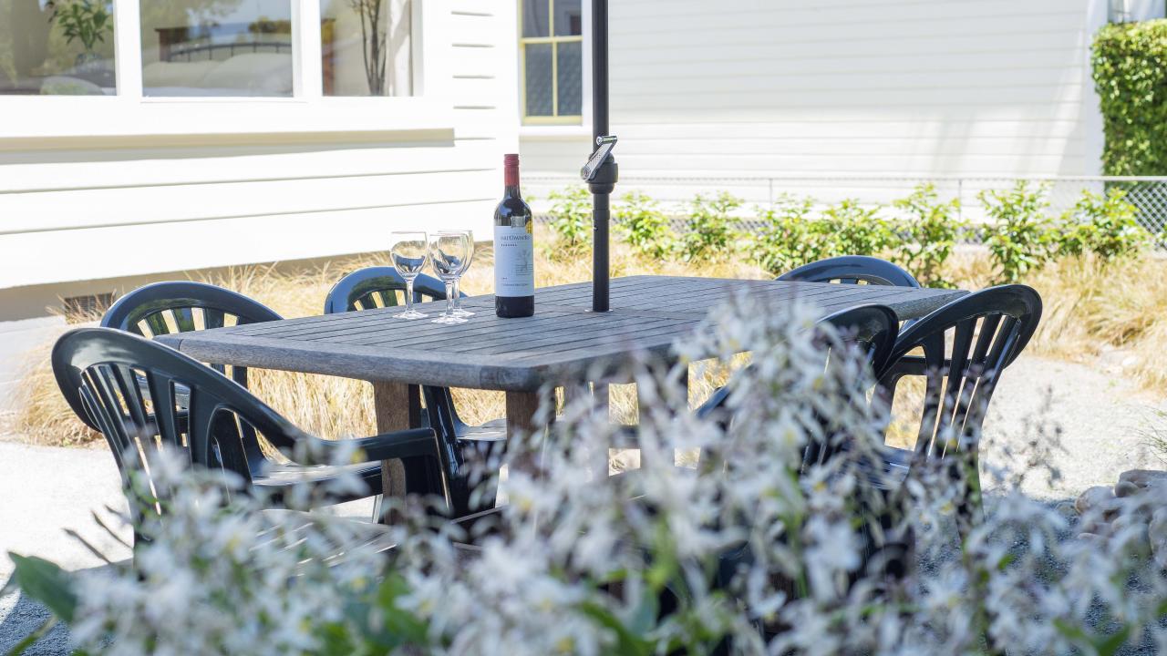 Outdoor dining and BBQ area.