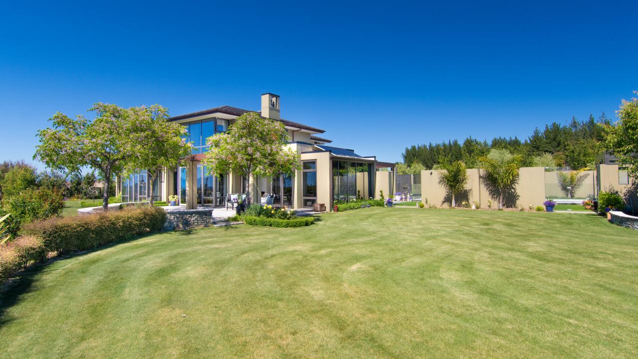 Extensive lawn area and gardens