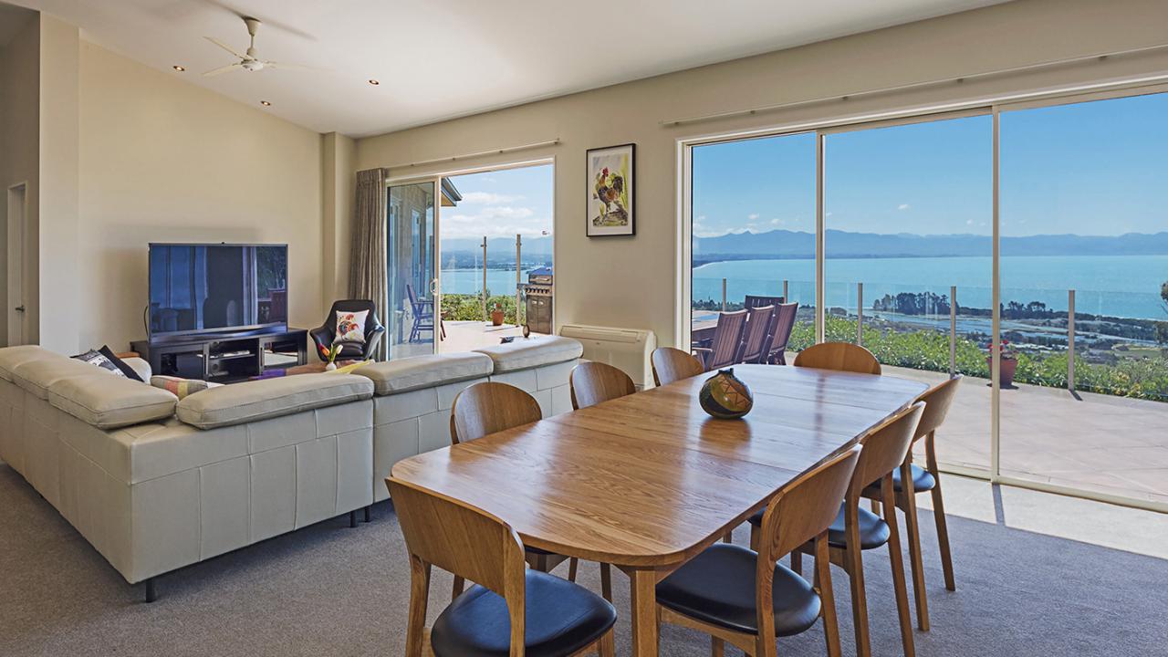 Spacious dining-living area with sumptuous views of Tasman Bay