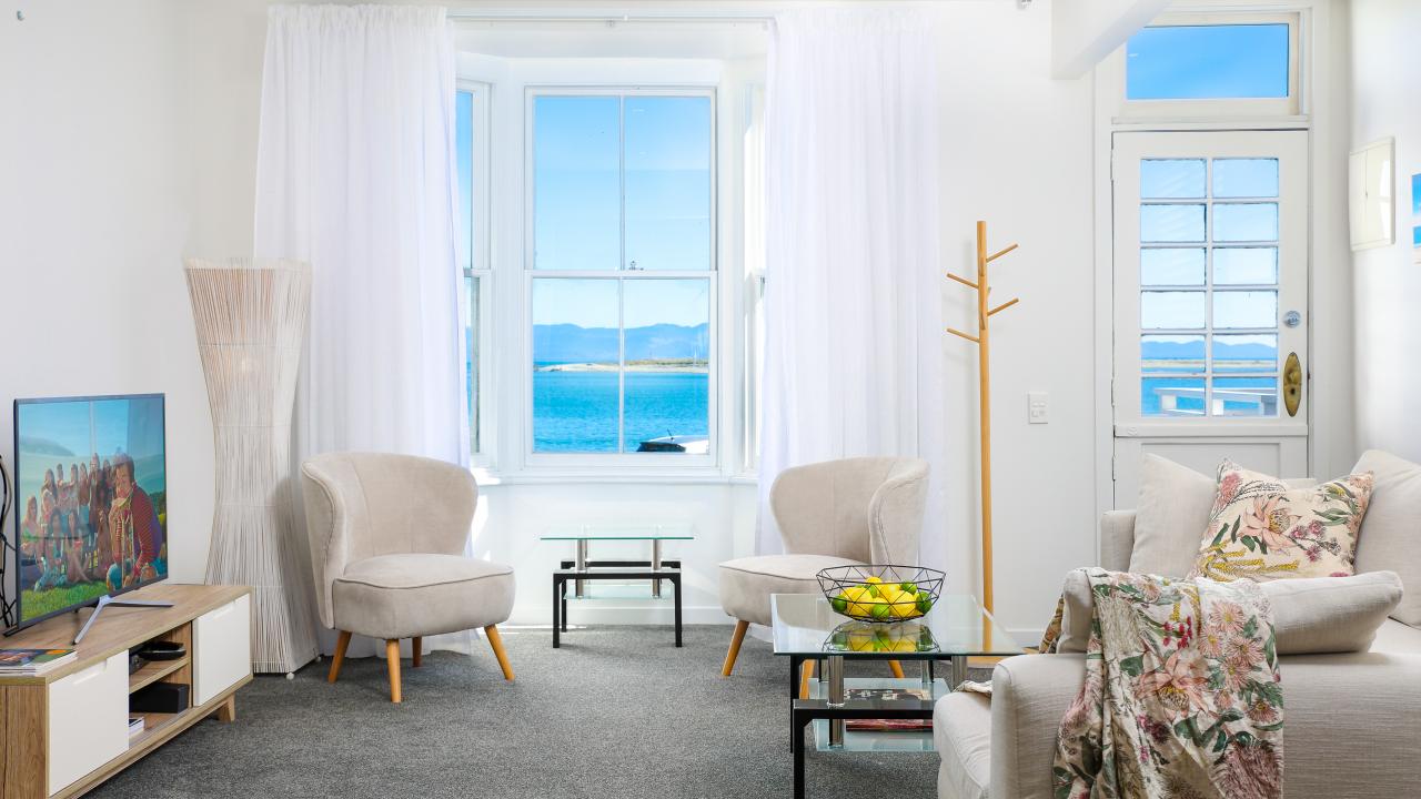 Living area with views over the Nelson Harbour entrance