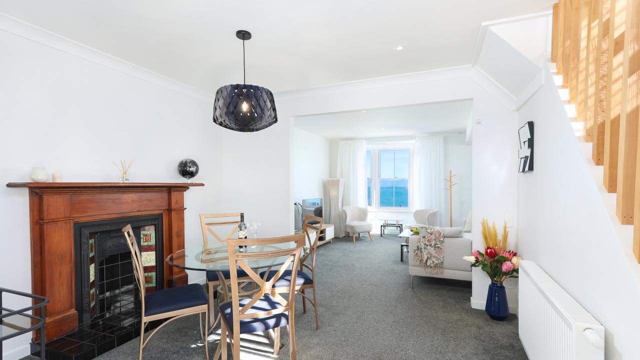 Dining area & views to living & sea