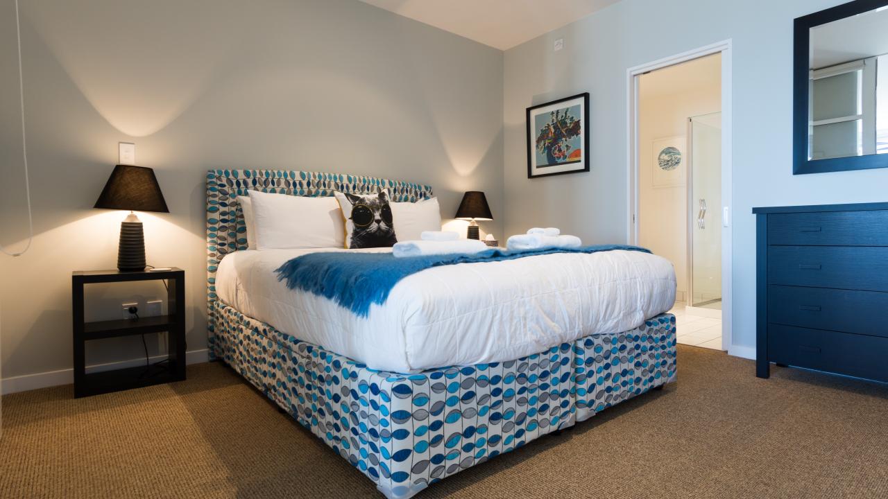 Beautifully presented Super King Bed opening to Ensuite Bathroom.