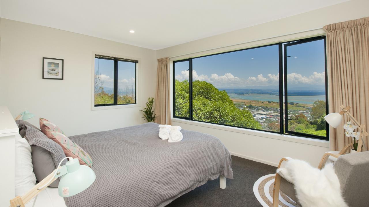 Master bedroom with Queen bed, walk-in robe.