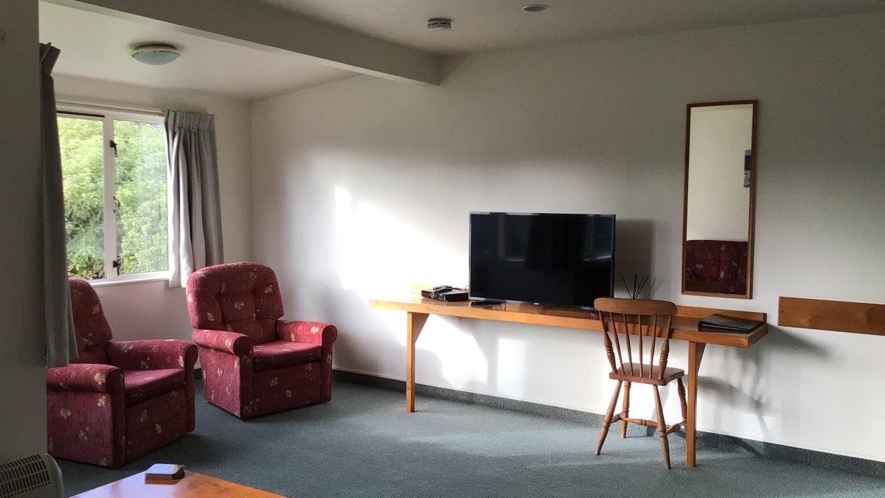 All units have a spacious sunny lounge, with chairs/sofa to relax on.