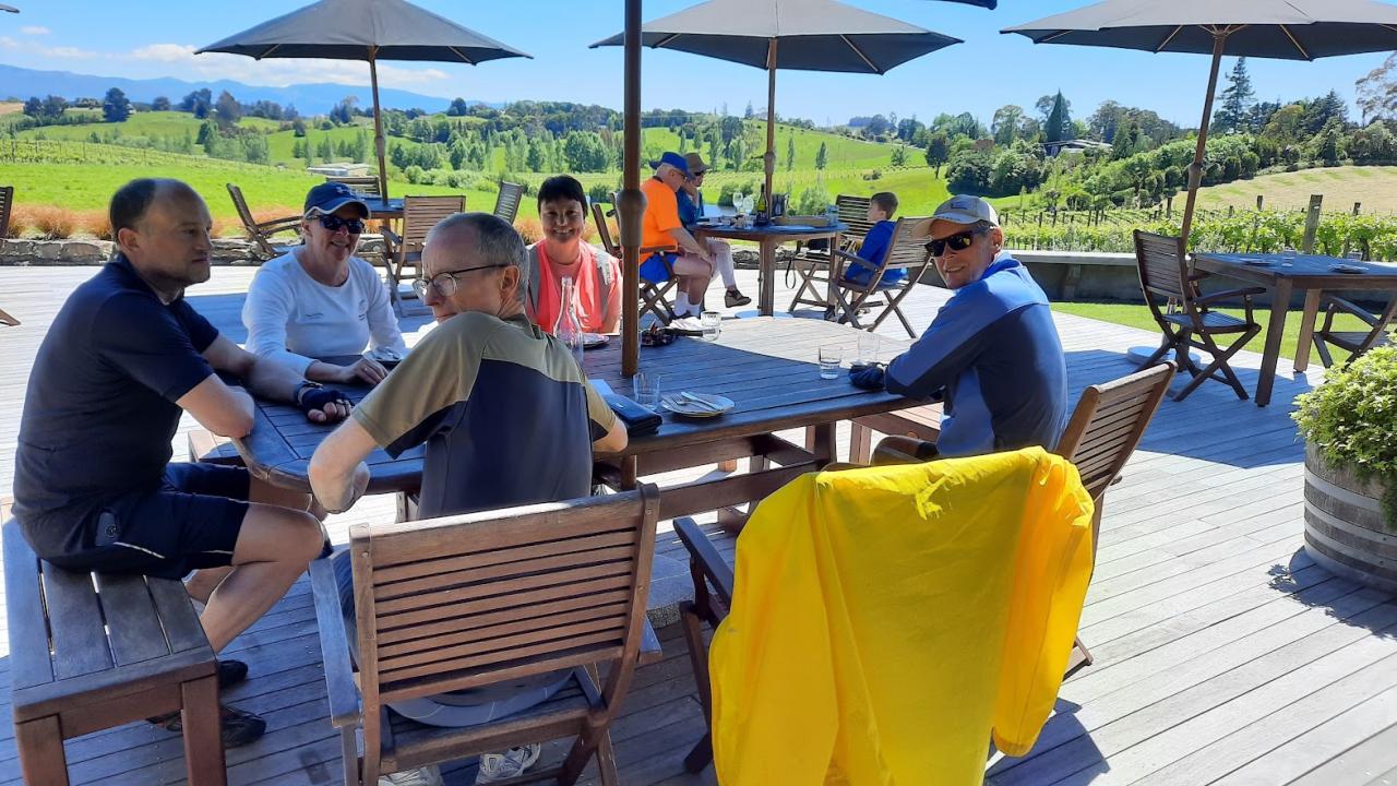 Cyclists enjoying a wine tasting at Gravity Winery