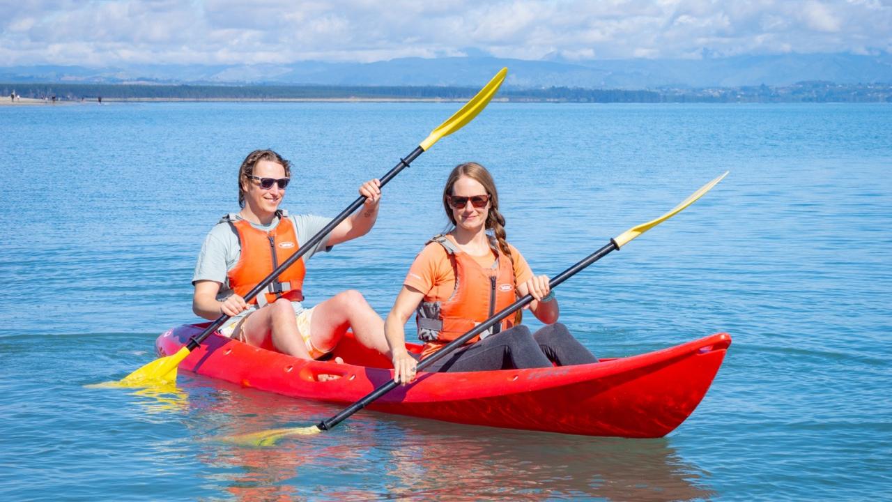 Sit-on-top kayak at Tāhunanui Beach.