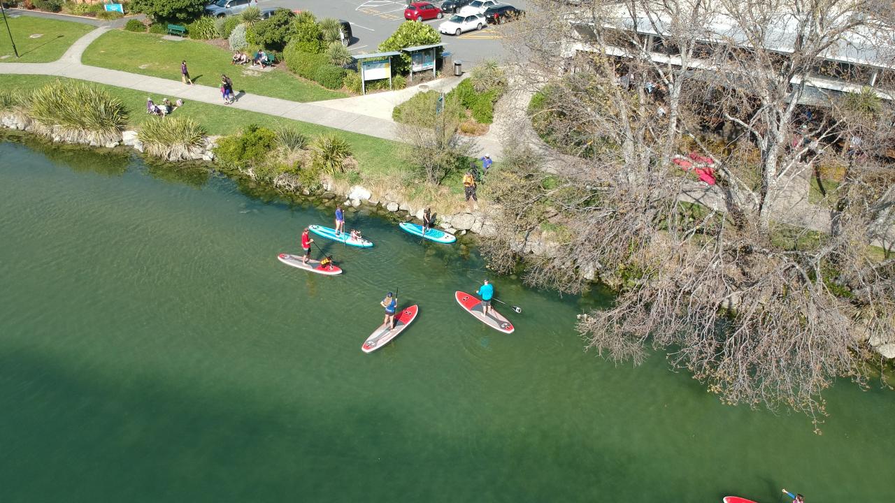 Enjoying the Maitai River by paddleboard.