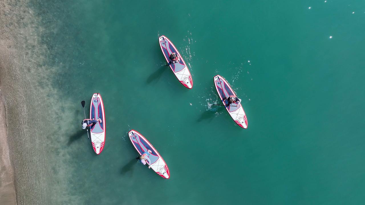 Then pick up your paddleboard and jump on the water