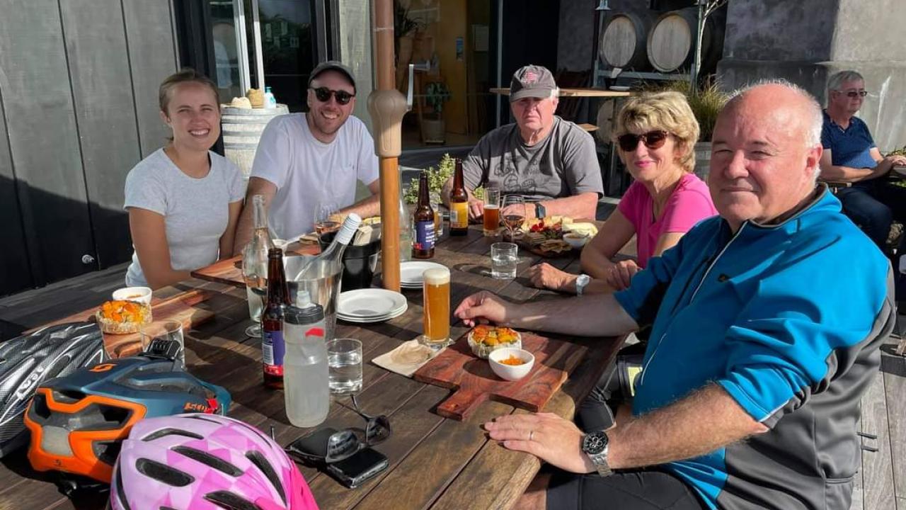 Cyclists enjoy lunch and wine tasting at a Moutere Winery