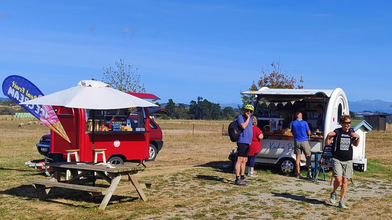 Popup coffee and waffles in a field near Rabbit Island