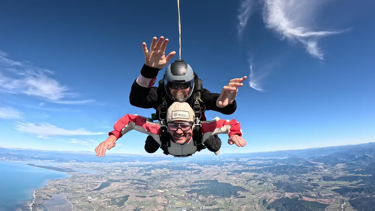 Soaring above Abel Tasman at 16,500ft. Who needs wings when you can jump? 