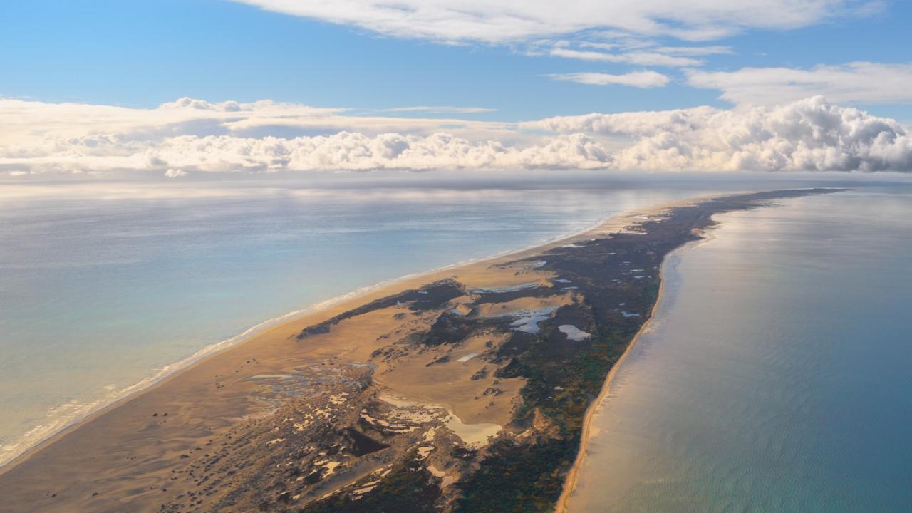 The unique Farewell Spit stretching into the Tasman Sea