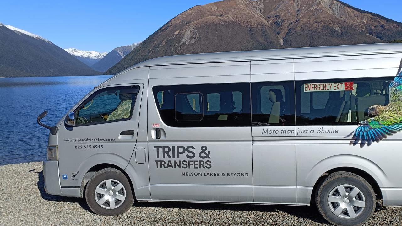 Comfy late model van for up to 11 passengers