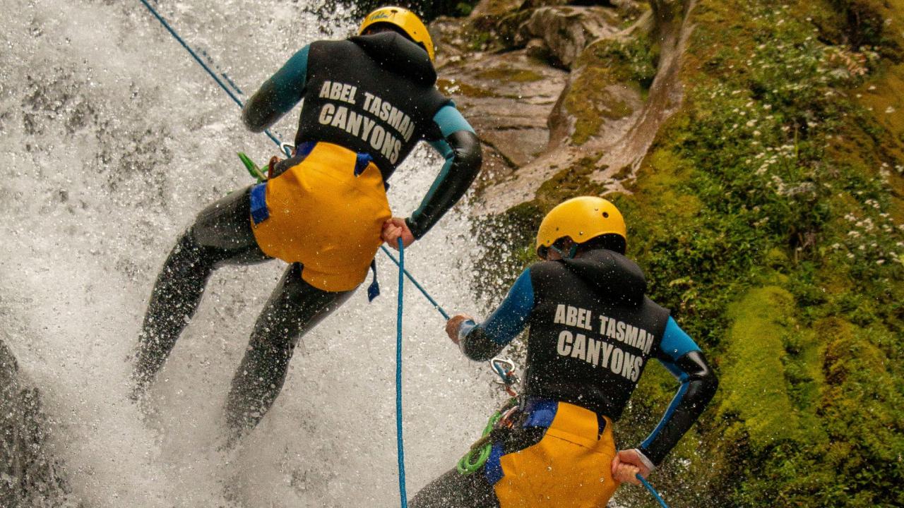 Abseiling through waterfalls 