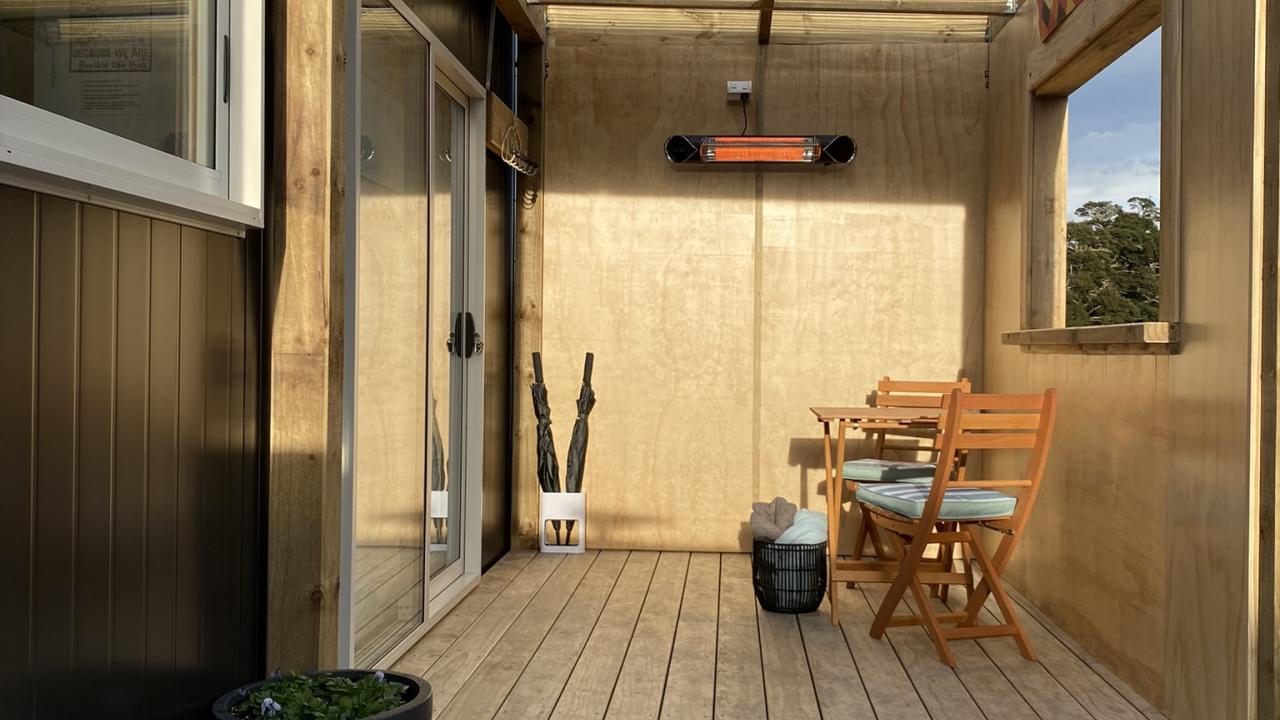 Outdoor BBQ area, enclosed porch for warmth & privacy, outdoor table & chairs.
outdoor heater.