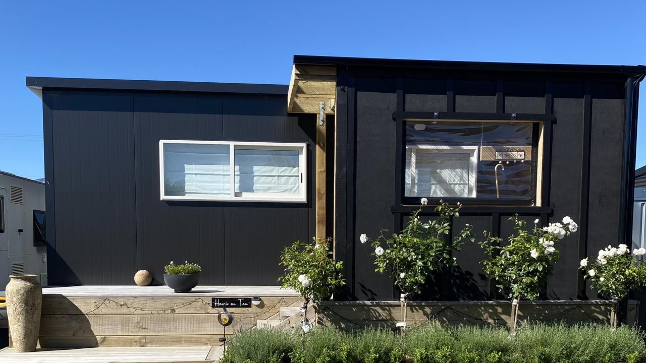 Haven On Tau studio with covered in porch & parking area.