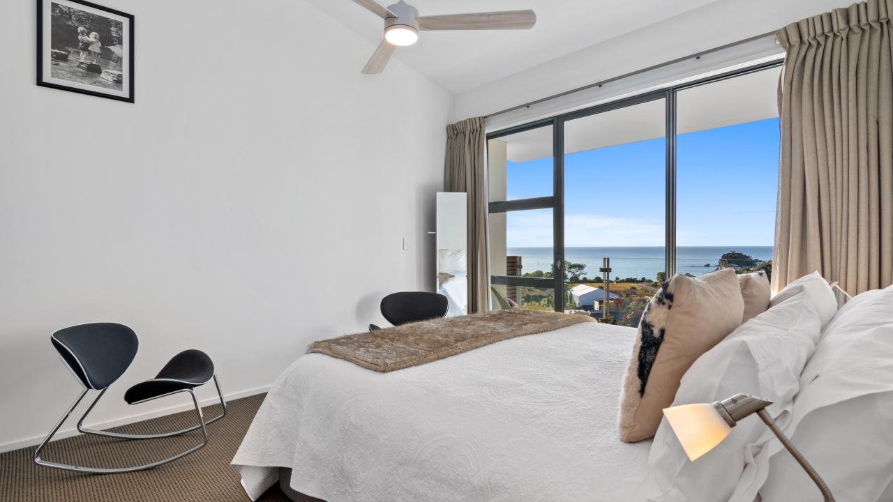 Double bedroom with Super King Bed and quality linen in the Kaiteriteri Luxury Apartment