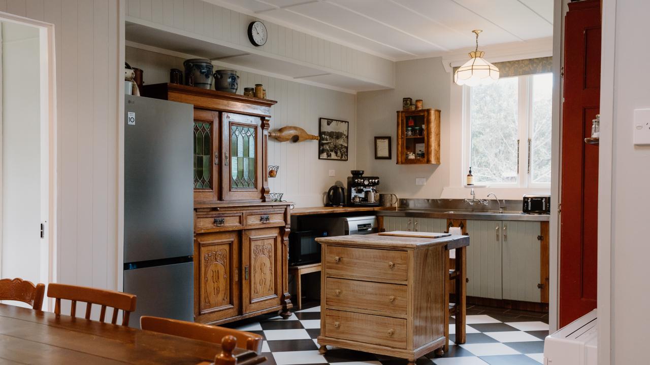 Timeless character meets modern convenience in the heart of the home - a kitchen where you can enjoy all the comforts of today, or cook over the wood stove for an authentic taste of tradition.