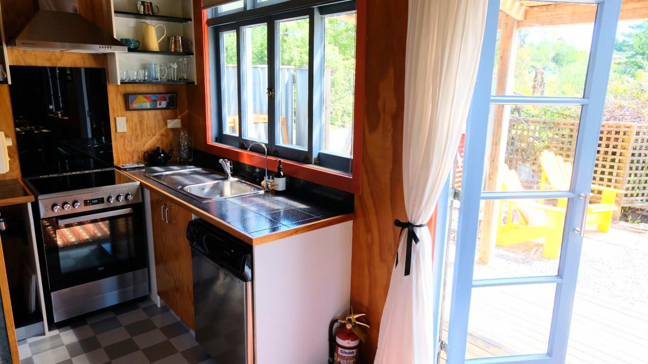 Modern kitchen, sunny warm cottage.