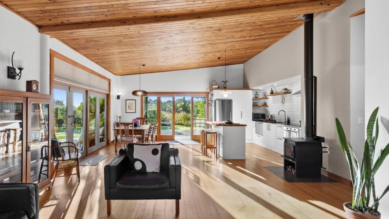 The living room has a wood fire and heat pump for your comfort. A smart TV, wifi speaker and well stocked book shelf for entertainment.