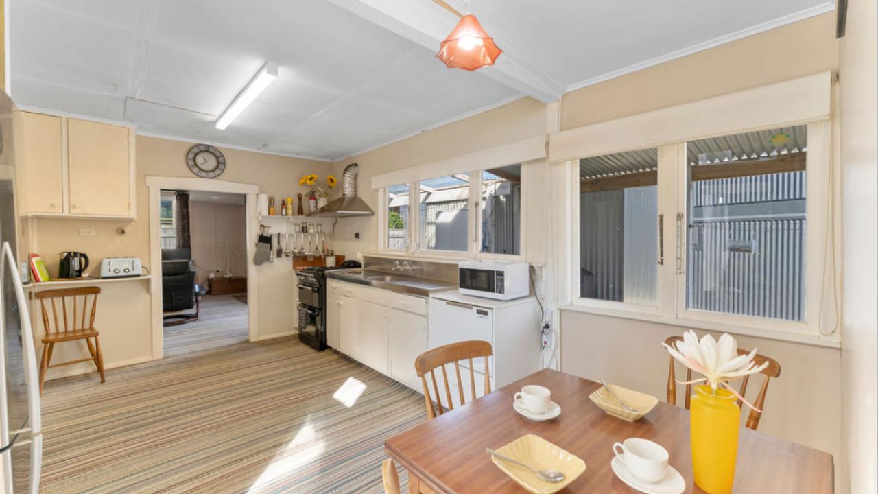 Full kitchen and dining area