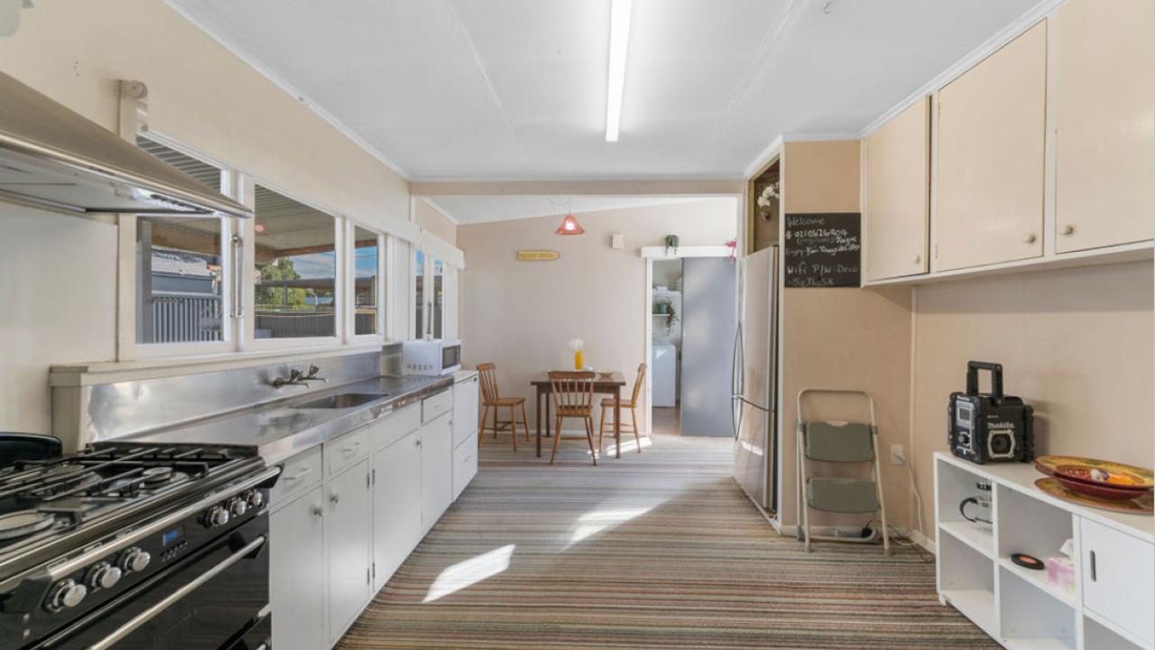 The large kitchen with dining area