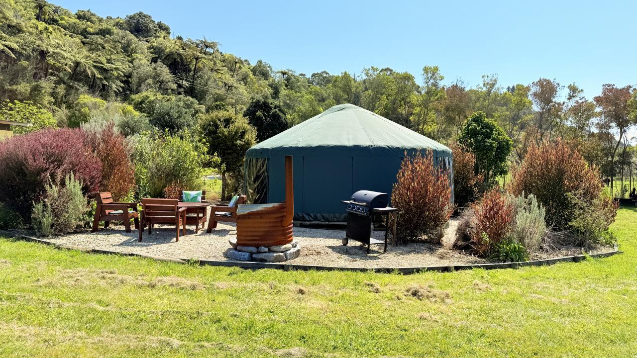 Outdoor dining area with ocean views, BBQ & Fire Pit.