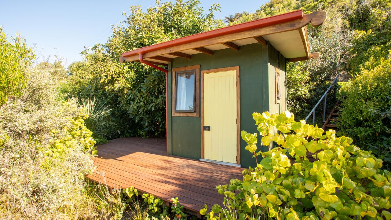 The bathroom unit is a few metres from the yurt, includes a hot shower, toilet and washing machine. Please note, this is a shared unit.