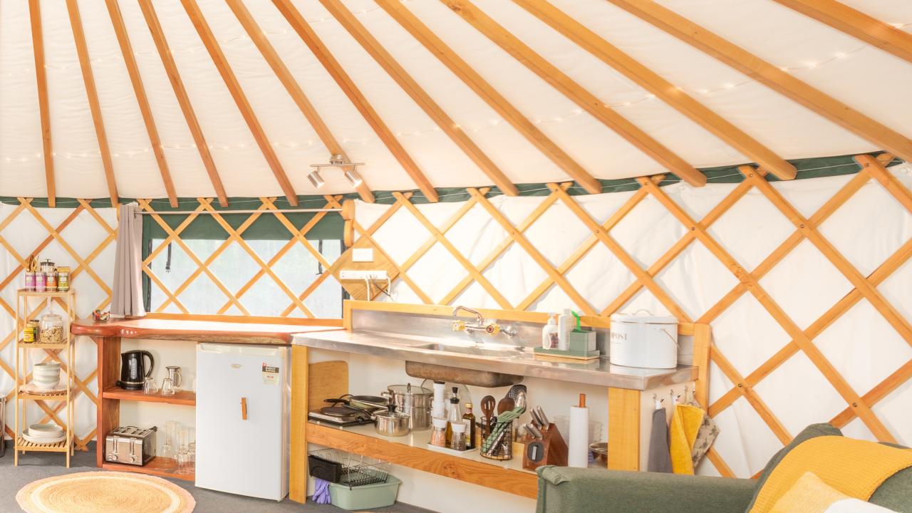 A kitchen area for self-catering (includes electric double hot plate, fridge, toaster & kettle).