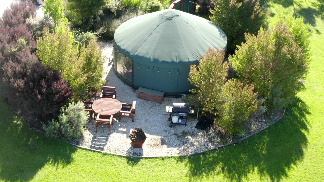 Outdoor dining area with ocean views, BBQ & Fire Pit.