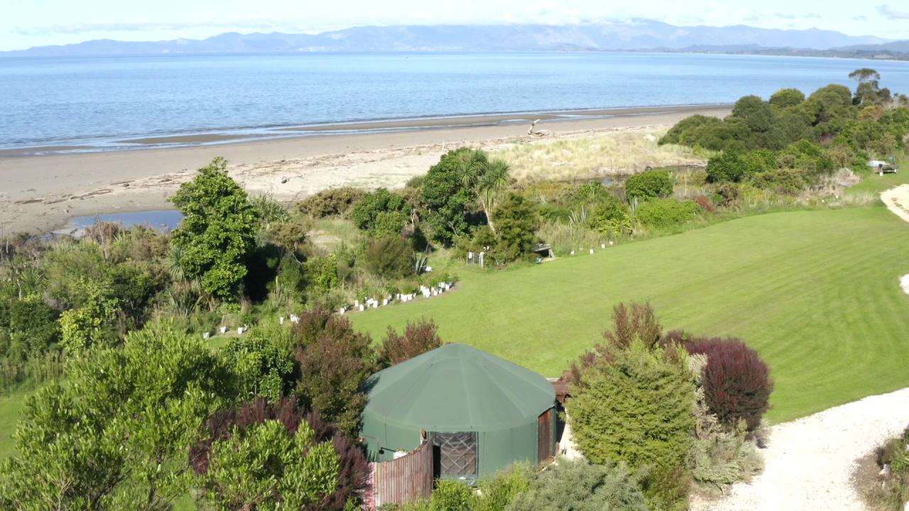 Wake up to the sound of ocean waves in this spacious yurt with private access onto the beach.