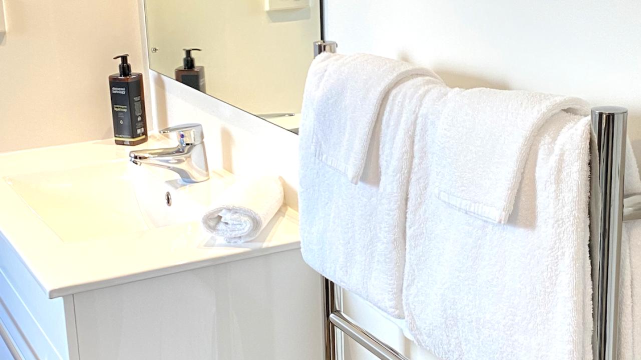 Modern bathrooms with heated towel rails