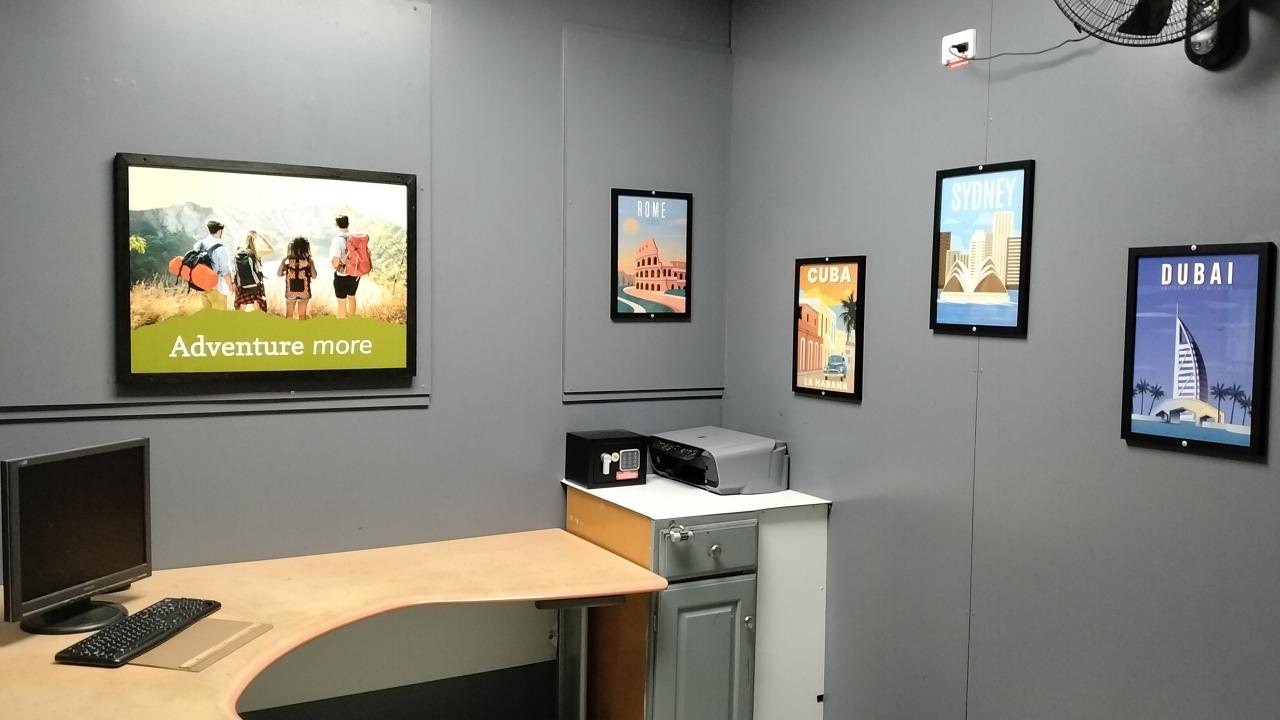 Explore the travel agency for hidden clues.